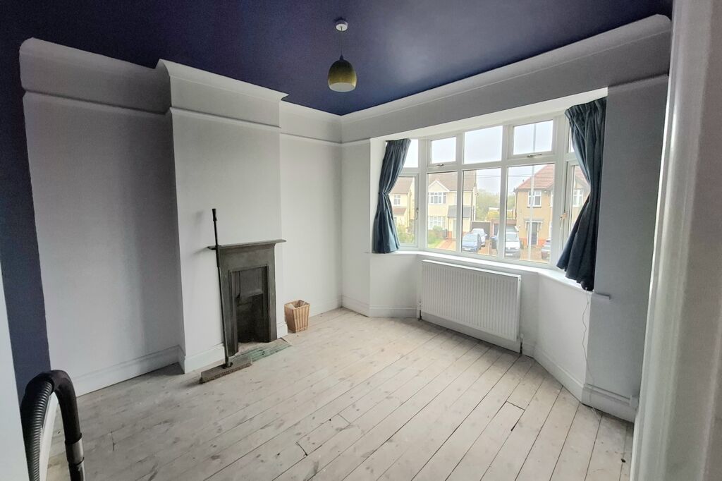 Finished refurbished 1920s bedroom with new low-temperature radiator.